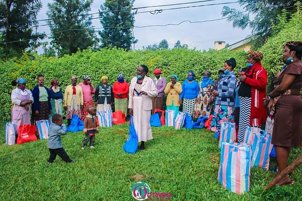 Widows recieve relief ( food packages ) from ComeTogether Widows and Orphans Organization in kenya